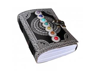 seven stone with back and silver color leather journal